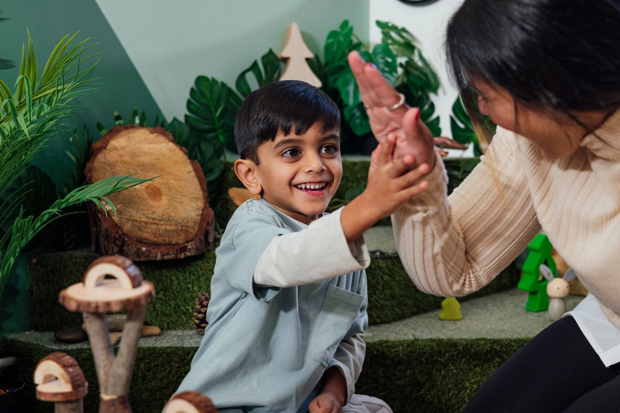 Child and clinician sharing a positive healthcare moment